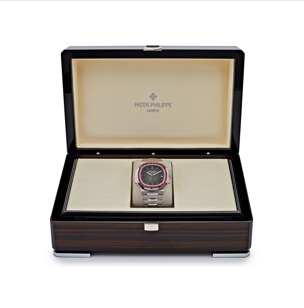 Patek Philippe
 Nautilus 5711/112P-001 Platinum Grey Dial Ruby Bezel