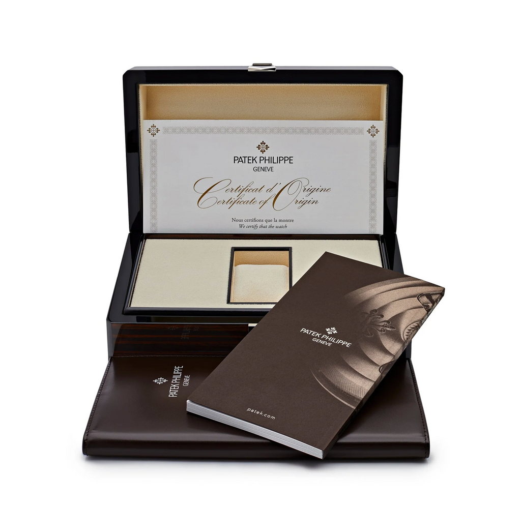 Patek Philippe
 Nautilus 5711/112P-001 Platinum Grey Dial Ruby Bezel